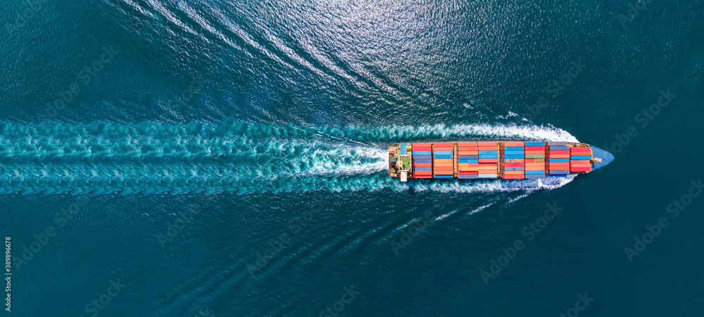 Aerial top view of cargo ship with contrail in the ocean sea ship carrying container and running  from container international port to custom ocean concept smart freight shipping by ship service - obrazy, fototapety, plakaty 