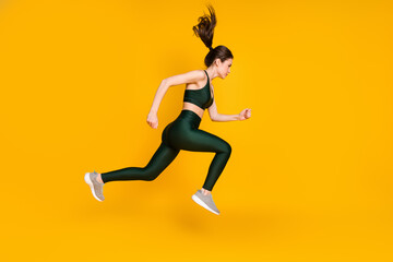 Sticker - Full length profile photo of sportive lady jump high up running wear sports suit shoes isolated yellow color background