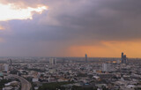 Fototapeta Londyn - Bangkok, Thailand - Nov 03, 2020 : City view of Bangkok before the sunset creates energetic feeling to get ready for the day waiting ahead. Copy space, Selective focus.