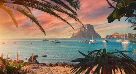 Cala d'Hort beach. Cala d'Hort in summer is extremely popular, beach have a fantastic view of the mysterious island of Es Vedra. Ibiza Island, Balearic Islands. Europe, Espana, Spain