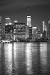 Black and white picture of New York cityscape at night, USA.