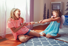 Two Little Mad Angry Girls Sisters Having Fight At Home. Friends Girls Can Not Share A Toy. Lifestyle Authentic Funny Family Moment Of Siblings Quarrel Life. Kids Bad Behaviour.