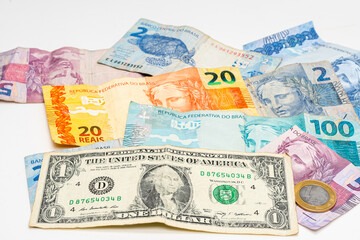 one dollar bill on Brazilian money notes, devaluation of Brazilian money