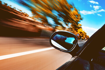 Wall Mural - car travel and adventur. closed image of car and road on travel and sunset sky.