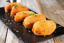 A View Of An Appetizer Plate Of Croquettes.
