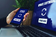 © shine.graphics - Hand holding smartphone doing installing update process with gearbox percentage progress and loading bar with installing update