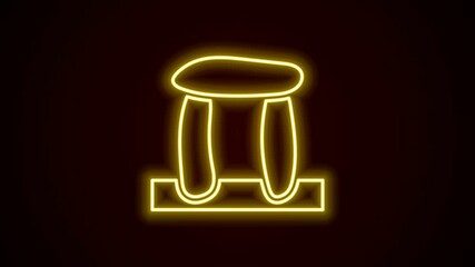 Sticker - Glowing neon line Stonehenge icon isolated on black background. 4K Video motion graphic animation