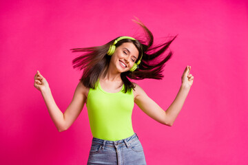 Canvas Print - Phot of young girl listen music headphones dance fun enjoy happy smile isolated over pink color background