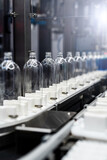 Fototapeta  - bottle production line - plastic industry - industrial background