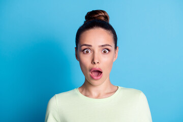 Wall Mural - Portrait of astonished girl look in camera shout isolated over blue pastel color background