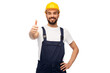 © Syda Productions - profession, construction and building - happy smiling male worker or builder in yellow helmet and overall showing thumbs up over white background