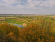 © Andrii Oleksiienko - Aerial view at amazing countryside bright autumn landscape. Colorful forests and fields of autumnal vivid colors.