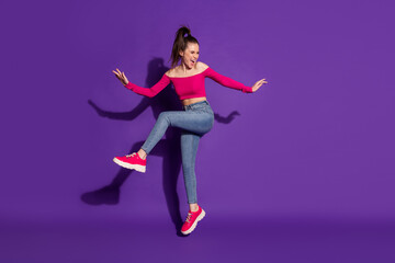 Canvas Print - Full length body size view of attractive cheerful overjoyed girl having fun jumping dancing isolated over bright violet color background