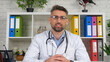 © viacheslav - Webcam view doctor remote teacher online tutor in medical coat wireless earphones looks camera teaches communicates speak students interns videocall chat conference laptop computer, distance education