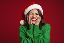Positive Young Woman In Christmas Santa Hat