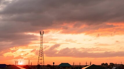 Wall Mural - Timelapse of summer colorful sunset over the outskirts of the city