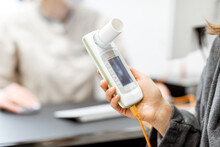 Patient Holding Spirometer