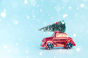 red car with a christmas tree and gifts on a blue background.