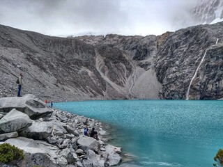 Laguna Paron, Huaraz, Peru. A blue-green lake in the Cordillera Blanca on the Peruvian Andes. At 4185 meters above sea level, it's surrounded by snowy peaks and a pyramid mountain. 