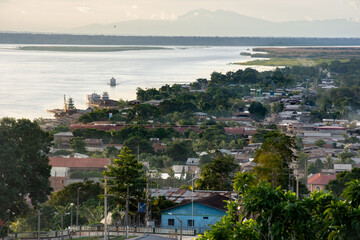 View from the height of the Ucayali river. In the city Contamana, Loreto, Peru. In the background is the mountainous area of ​​the Cordillera Azul National Park