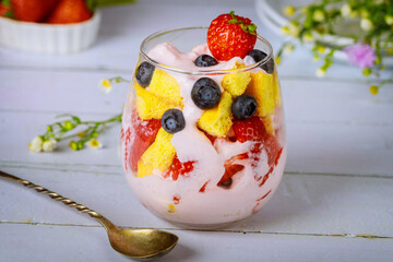 Wall Mural - Fruit trifle with pound cake and yogurt in glass.