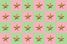 Graphic Pattern Of Starfish On Yellow And Pink Background