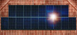 © TGI/Tetra Images - Solar panels reflecting sun on house roof