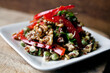 © Andrew Scrivani - Close up of quinoa, lentil sprout and arugula salad served on plate