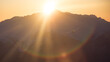 © Christian Tisdale/Stocksy - A single engine airplane flying through snowy mountains at sunset