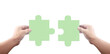 © violetkaipa - Hand of connecting jigsaw puzzle,Concept of teamwork