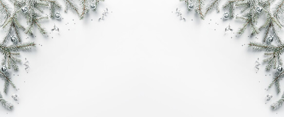 Wall Mural - merry christmas frame made of white fir branches on white background with silver decoration,sparkles