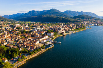Wall Mural - View from drone of summer Luino cityscape and Lake Maggiore, province of Varese, Lombardy, northern Italy