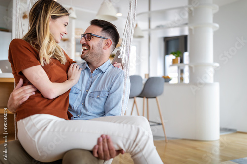 Fotomural Cute couple in love hugging and having great time together at home