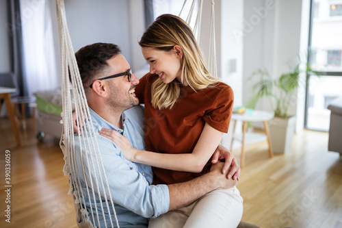 Fotomural Romantic happy young couple in love relax at modern home and have fun