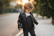 © Aleksandr - Portrait of adorable little girl walkin in autumn park during beautiful sunset