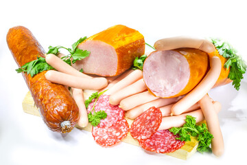 Wall Mural - Meat and sausages. Isolated on white.