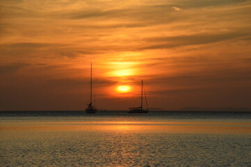 Wall Mural - Sunset over the beaches on the untouced paradise island of Ko Phayam in the Andaman Sea, Thailand