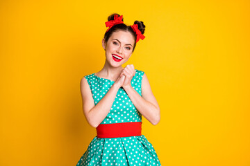 Poster - Portrait of nice charming sweet cheerful girl wearing teal dress enjoying party isolated over vibrant yellow color background