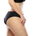 © master1305 - Side view. Overweight woman with fat cellulite legs and buttocks, obesity female body in black underwear isolated on white background. Orange peel skin, liposuction, healthcare and beauty treatment.