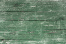 Vintage Green Wood Background Texture With Knots And Nail Holes. Old Painted Wood Wall. Brown Abstract Background. Vintage Green Wooden Dark Horizontal Boards. Front View With Copy Space