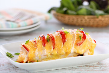 Wall Mural -  Chicken caprese. Tender chicken breast baked with slices of tomato and cheese.