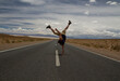 © Gonzalo - B boy. Young caucasian man handstand in the asphalt desert road.