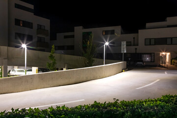 Canvas Print - access road to underground garages at night