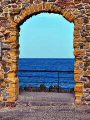 Poster - archivolt and glimpse of the sea in cefalu sicily italy