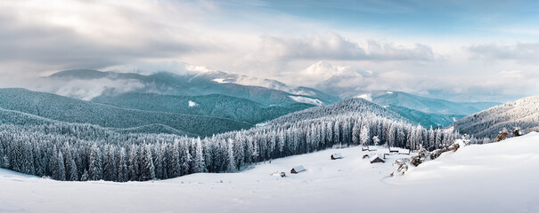 Fantastic winter landscape with snowy trees. Carpathian mountains, Ukraine, Europe. Christmas holiday background. Landscape photography