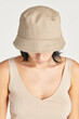 © Rawpixel.com - Woman in a beige bucket hat