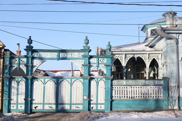 Gothic style in wooden architecture. Prushakevich's house (1895) with carved windowds and gate in Ulyanovsk city, Russia. Ulyanovsk landmark, Ulyanovsk monument