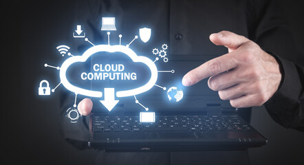 Wall Mural - man holding laptop computer. cloud computing