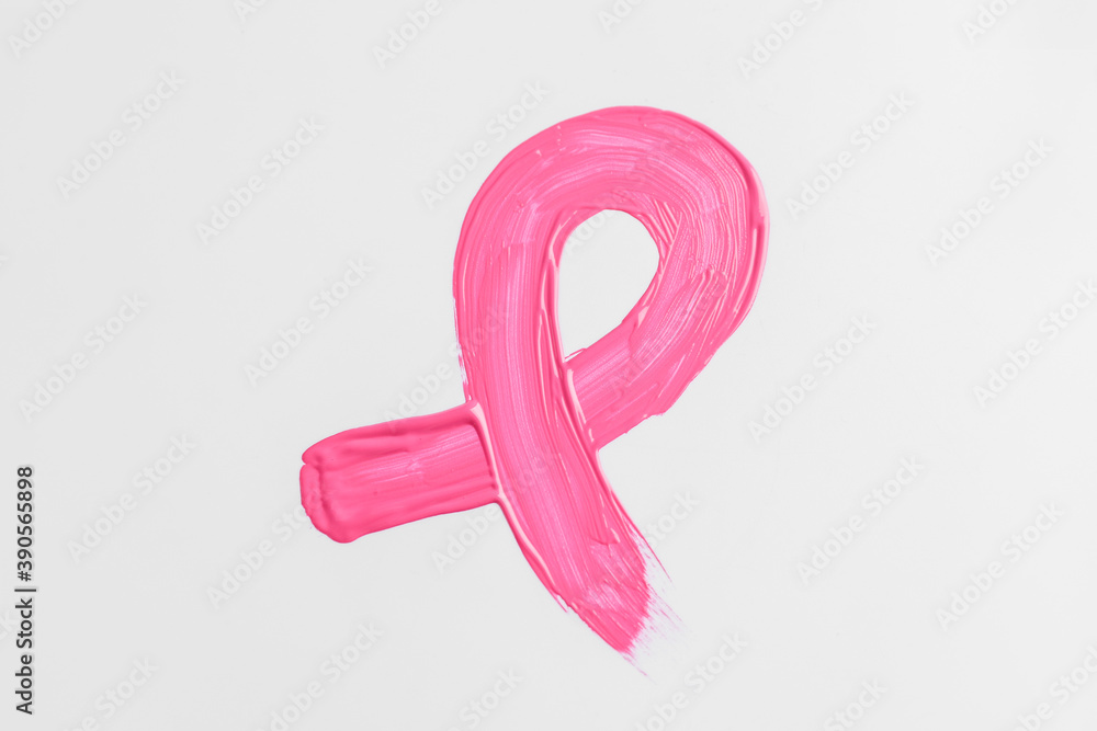 Painted pink ribbon on white background. Breast cancer awareness concept