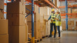Retail Warehouse full of Shelves with Goods in Cardboard Boxes, Male Worker and Female Supervisor Holding Digital Tablet Discuss Product Delivery while Scanning Packages. Distribution Logistics Center